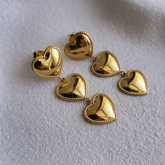 Triple hearts drop earring